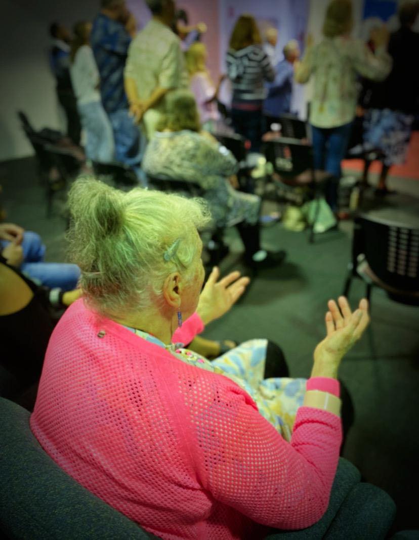 ODCF congregation in worship and prayer